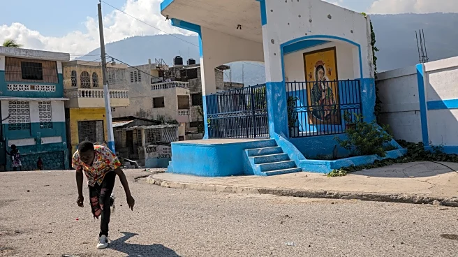 Dozens killed in Haiti's capital as armed men break away from gang coalition in bid for power