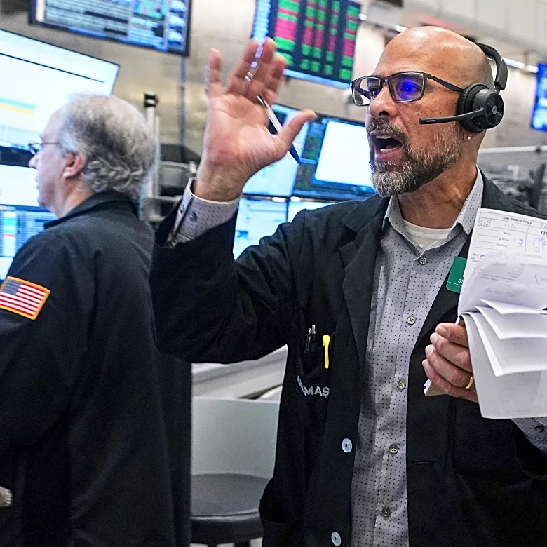 Wall Street is flat as Exxon Mobil climbs and JPMorgan Chase drops