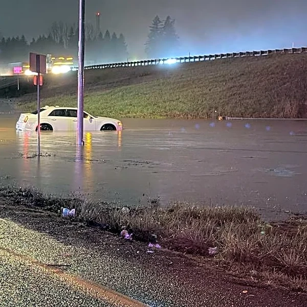 Storms bring heavy rain to the Pacific Northwest, snow and freezing rain to the Upper Midwest