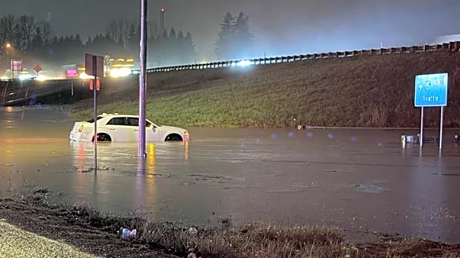 Storms bring heavy rain to the Pacific Northwest, snow and freezing rain to the Upper Midwest