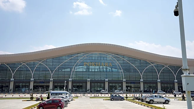 Nepal charges dozens and says corruption inflated an airport's costs by $74 million