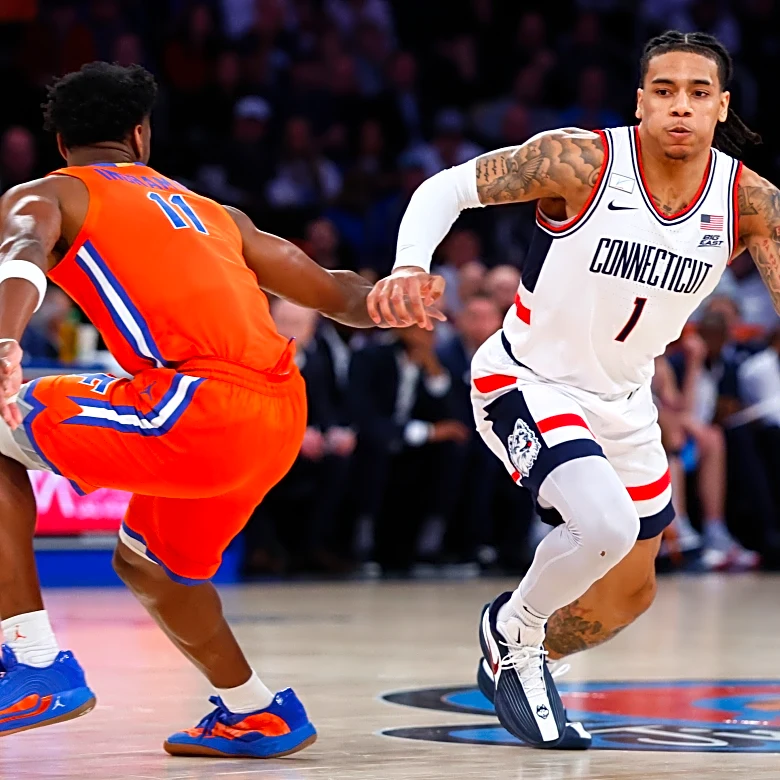 Ball scores 19 points as No. 5 UConn beats No. 18 Florida 77-73 in Jimmy V Classic