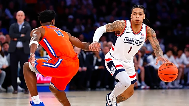 Ball scores 19 points as No. 5 UConn beats No. 18 Florida 77-73 in Jimmy V Classic