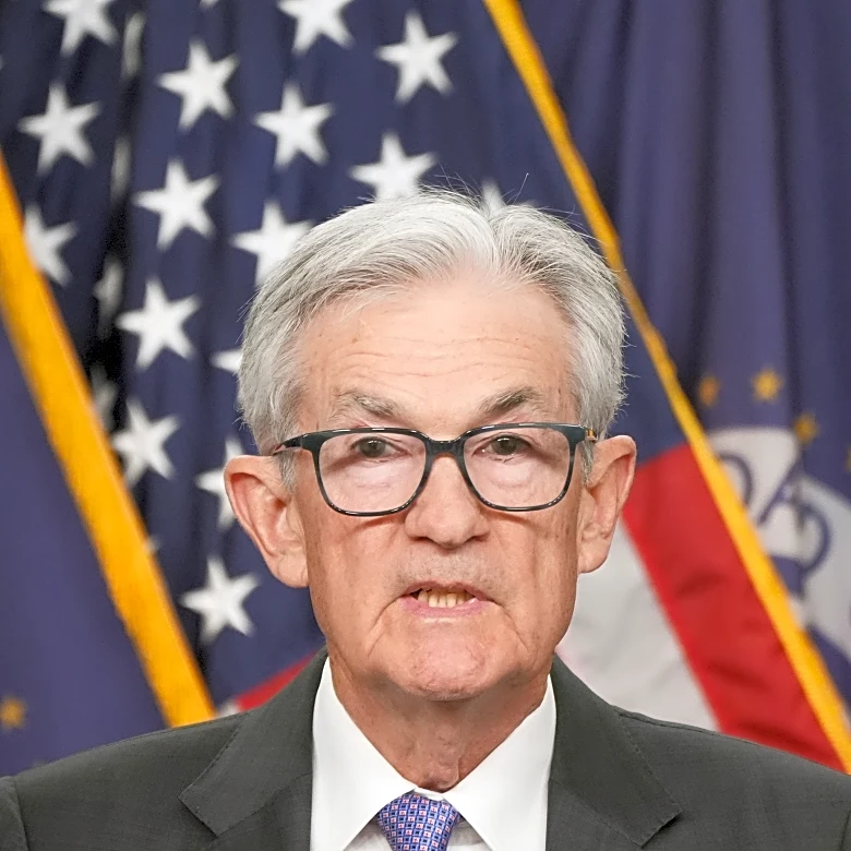 Federal Reserve cuts key rate, sees healthier economy next year