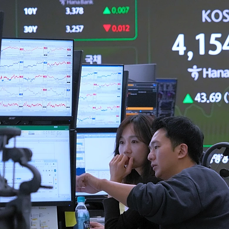 Asian shares track US stock market's rise to record highs despite AI bubble worries