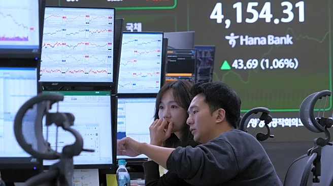 Asian shares track US stock market's rise to record highs despite AI bubble worries