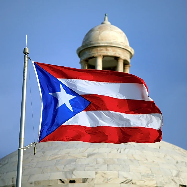 A new federal report scrutinizes Puerto Rico's tax incentives luring wealthy Americans