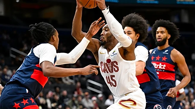 Mitchell scores 24 of his 48 points in the 4th quarter to rally Cavaliers past Wizards 130-126