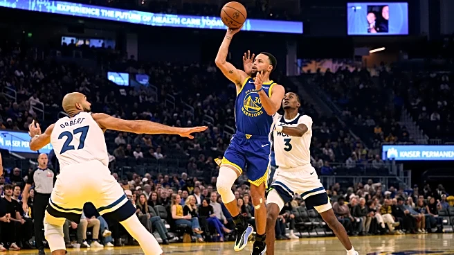 Curry scores 39 in return but Timberwolves top Warriors 127-120 without Edwards