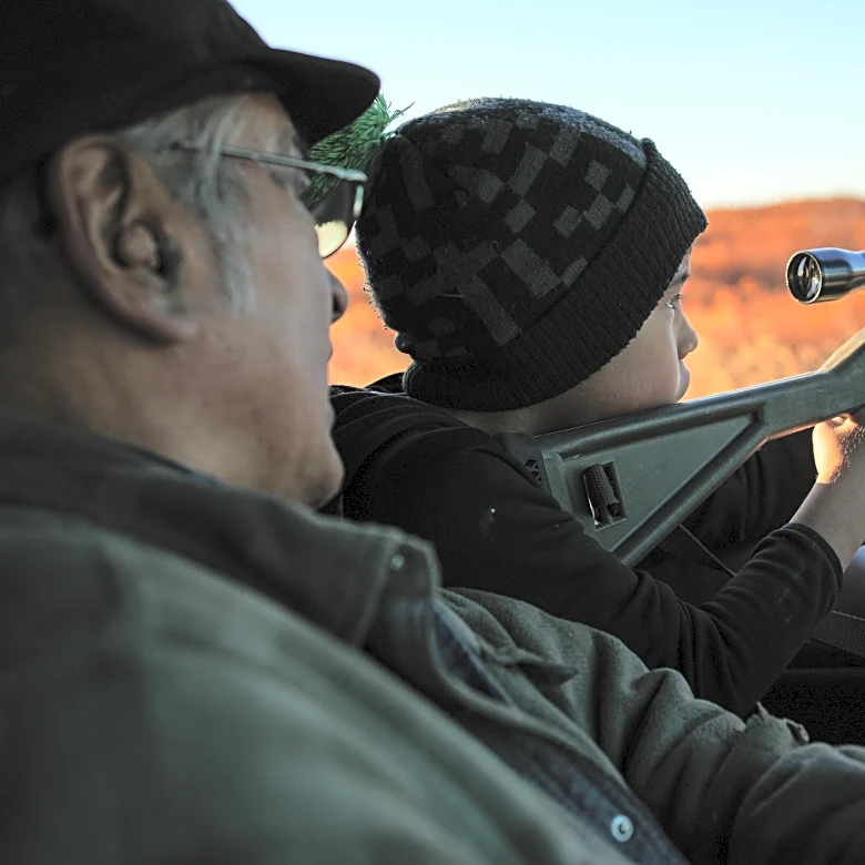 In Alaska’s warming Arctic, photos show an Indigenous elder passing down hunting traditions