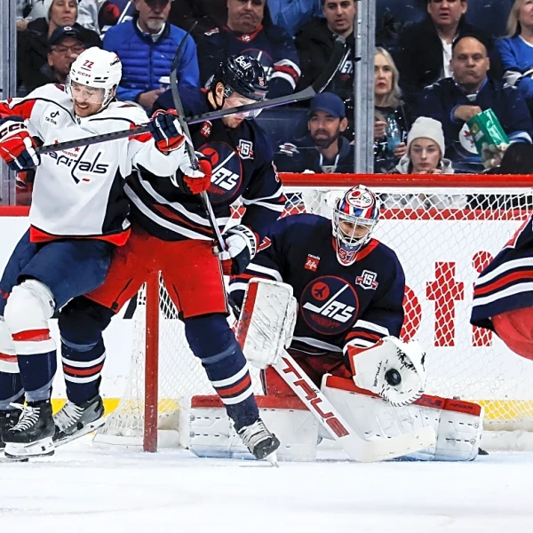 Hellebuyck makes 24 saves in return from knee injury, Jets beat Capitals 5-1