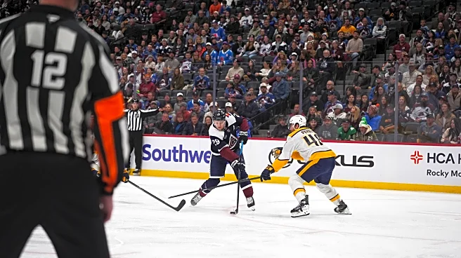 MacKinnon has goal and assist as Avalanche beat Predators 4-2 for 11th straight home win