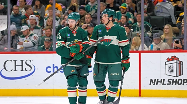 Quinn Hughes scores in Minnesota debut as Wild beat Bruins 6-2 for 4th straight win