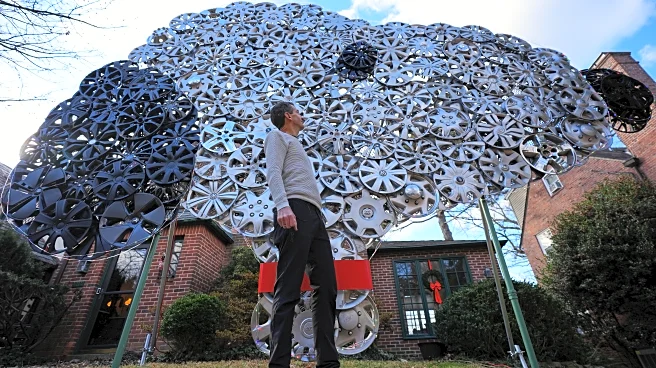 Baltimore cyclist finds joy in collecting lost hubcaps and stringing them into art