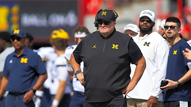 Poggi tells Michigan signees and parents to expect a new coach by end of month, AP source says