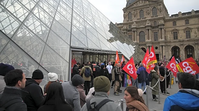 Louvre workers vote to extend a strike as the museum partially reopens