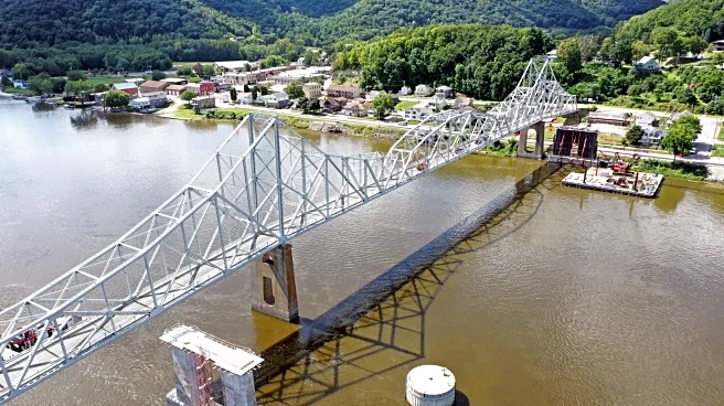 Implosion takes down a nearly century-old Mississippi River bridge