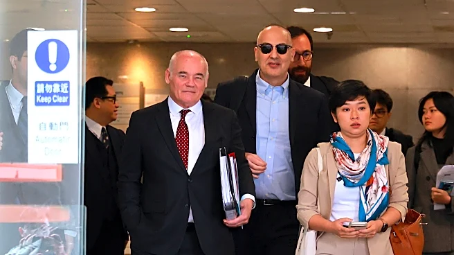 WSJ's parent firm on trial in Hong Kong, accused of dismissing reporter over union role