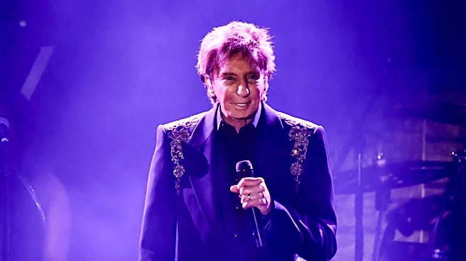 Barry Manilow to have surgery for early-stage lung cancer and postpones January concerts