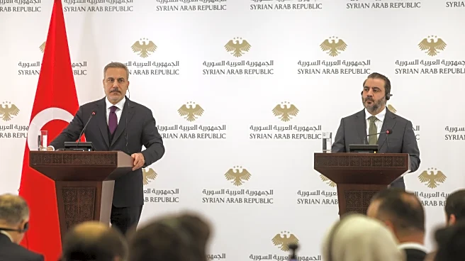 Clashes flare as top Turkish officials visit Syria ahead of deadline for Kurdish integration