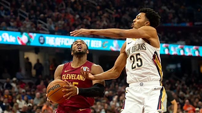 Donovan Mitchell and Sam Merrill propel Cavaliers to 141-118 victory over Pelicans