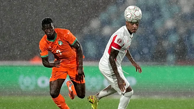 Ivory Coast starts Africa Cup title defense with a win as proud dad Zidane sees Algeria beat Sudan