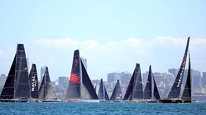 Defending champion LawConnect leads yachts out of Sydney harbor in annual ocean race to Hobart