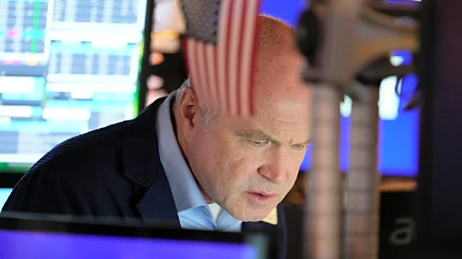 Stocks close slightly lower in quiet post-Christmas trading