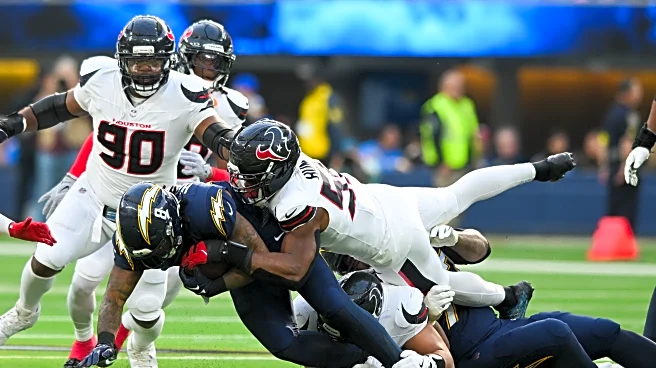 Texans' defense swarms Chargers after offense's fast start in playoff-clinching victory