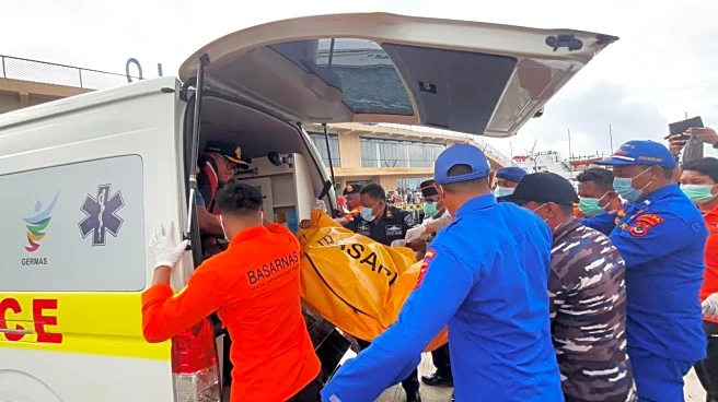 Indonesian rescuers find a body while searching for Spanish soccer coach and 3 children