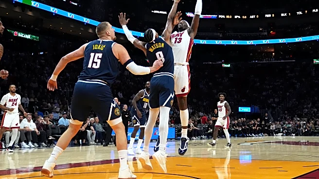 Nuggets star Nikola Jokic hurts left knee, limps off court at halftime in Miami