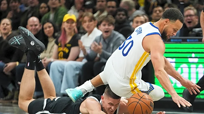 Curry, Butler lead the Warriors to a 120-107 victory over the Nets