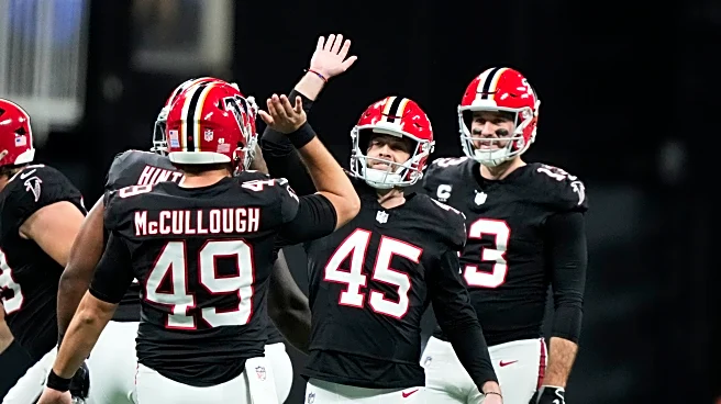 Robinson runs for 195 yards as Falcons recover to upset Rams 27-24 on 51-yard field goal by Gonzalez