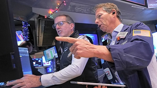 Stocks edge lower as 2025 winds down while gold and silver rise