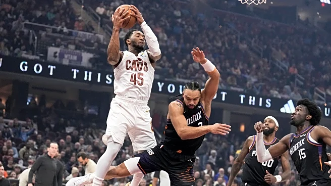 Donovan Mitchell scores 34 points to propel Cavaliers to 129-113 victory over Suns