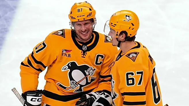 Letang scores in OT in his 1,200th game to give Penguins 4-3 win against Red Wings