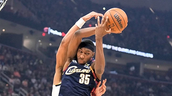 Donovan Mitchell scores 33 points, Cavaliers outlast short-handed Nuggets 113-108