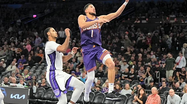 Booker scores 20 in 1st quarter, finishes with 33 as Suns rout Kings 129-102