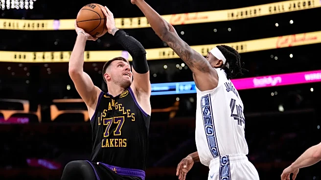 Doncic and James score 30+ each for 1st time this season in Lakers' 128-121 win over Grizzlies