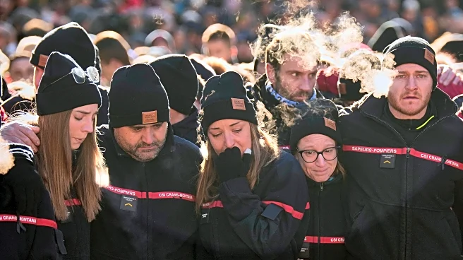 Hundreds march in silence to honor victims of Swiss bar fire that left 40 dead