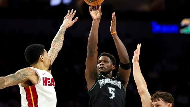 Edwards has 26 points to help Wolves beat Heat 122-94