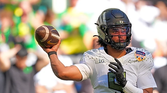 Mendoza, unbeaten Indiana to face Moore, Oregon in rematch of Big Ten rivals in Peach Bowl semifinal