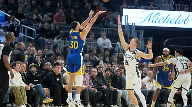 Stephen Curry, Jimmy Butler lead Warriors past Bucks, 120-113
