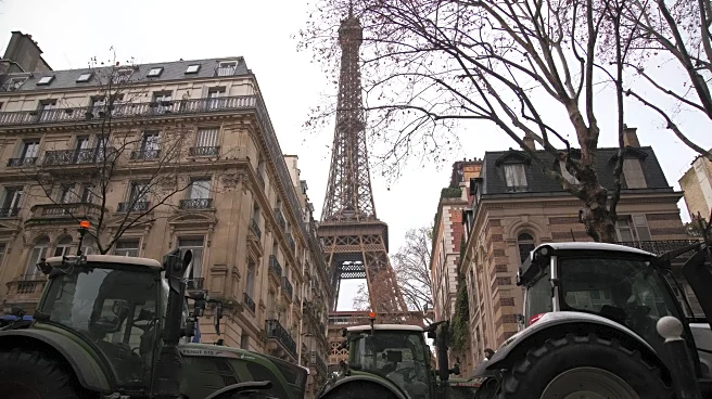 Farmers drive tractors through Paris and block highways in Greece to protest free trade deal