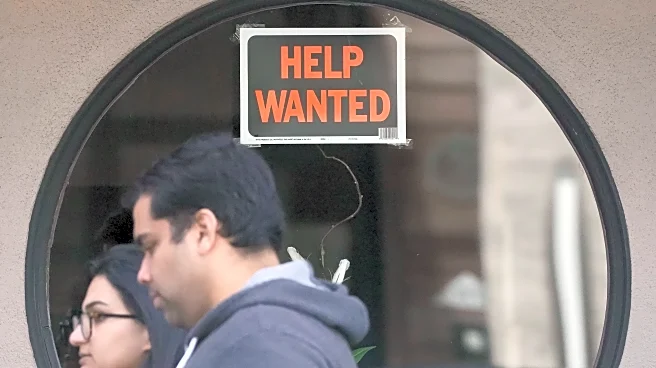 Slightly more Americans file for jobless benefits in the last week of 2025, but layoffs remain low