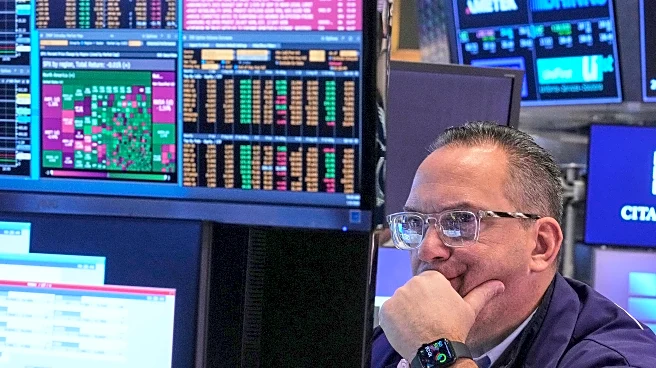 Wall Street ticks toward a record following mixed data on the job market