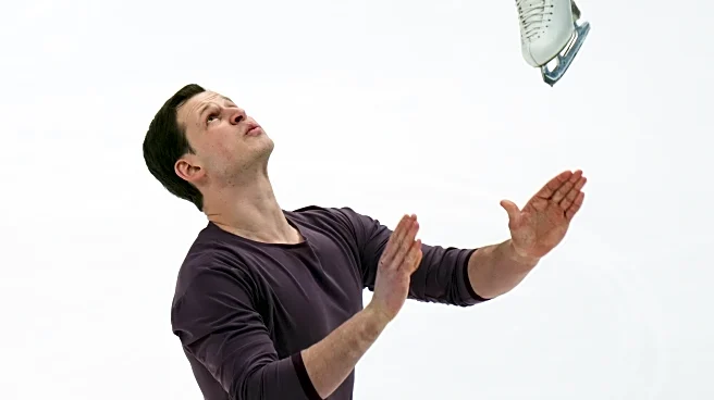 Efimova and Mitrofanov defend pairs title but face nervous citizenship wait for Olympic spot