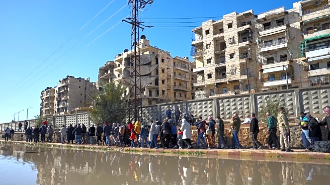 Kurdish fighters evacuated from Aleppo after days of violent clashes