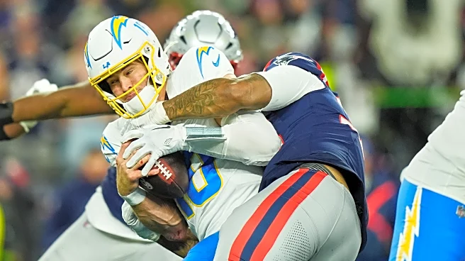 Chargers coach Jim Harbaugh says 'Those that stay will be champions.' QB Justin Herbert isn't sure