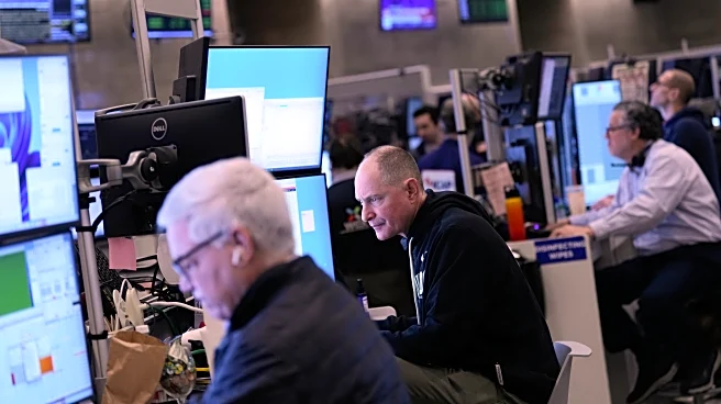 Stocks of credit-card companies slump as Wall Street overall drifts in mixed trading